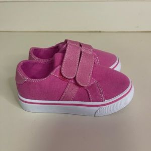 Pink shoes that had never been worn ,been giving to my daughter